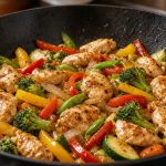 Chicken stir fry in a wok