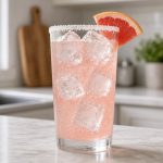 Paloma cocktail with a grapefruit wedge